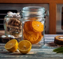 Hermetic glass storage jar with dried orange slices