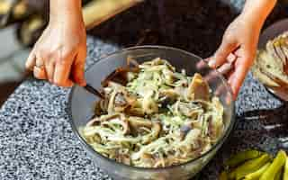 Free photo herring with onions in a bowl homemade food concept