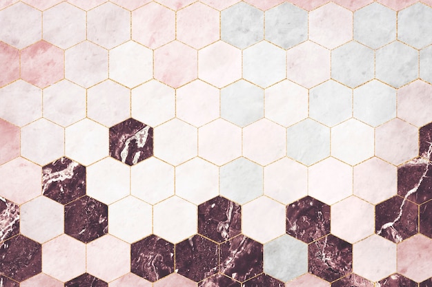 パターン化された六角形のピンクの大理石のタイル