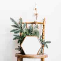 Free photo hexagonal frame on chair