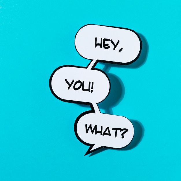 Hey you! exclamation word with shadow on blue background