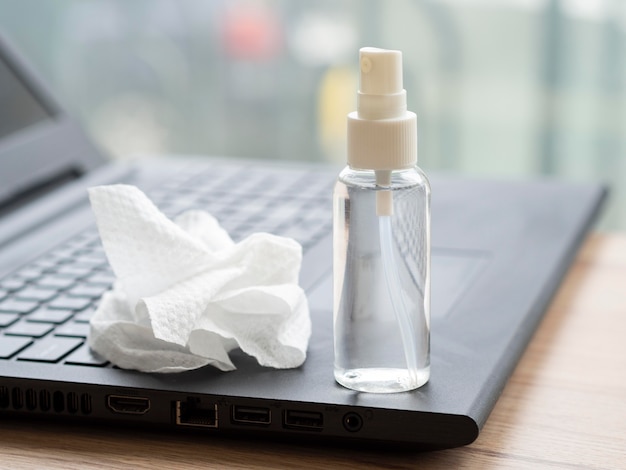 High angle of ablution and laptop with napkin