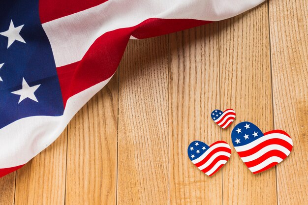 High angle of american flags on wooden surface