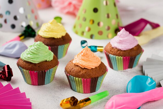 High angle arrangement with colorful glaze on muffins