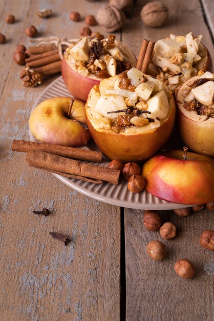 High angle arrangement with cooked apple and cinnamon sticks