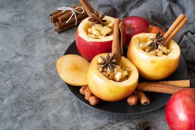 High angle arrangement with cooked apples and cinnamon sticks