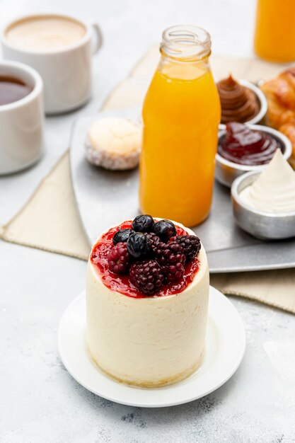 High angle arrangement with delicious cake and healthy juice