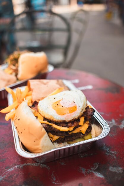 High angle arrangement with fries and cheeseburger