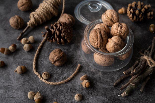 High angle arrangement with nuts and pine cones