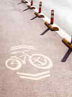 Free photo high angle of arrows on bicycle lane