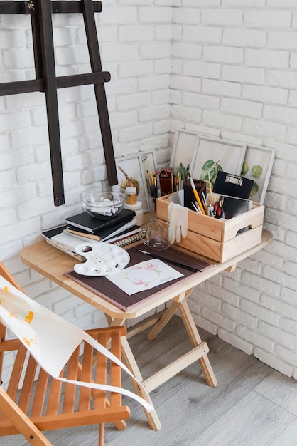 High angle art desk concept with notebooks