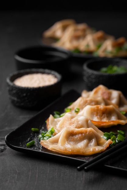 High angle of asian dish on plate with herbs