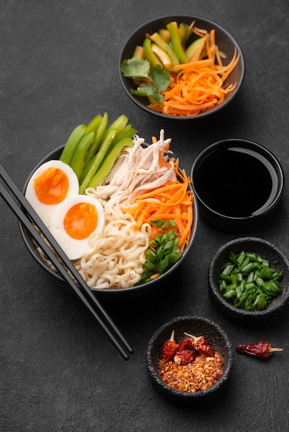 High angle of asian dish with salad and eggs