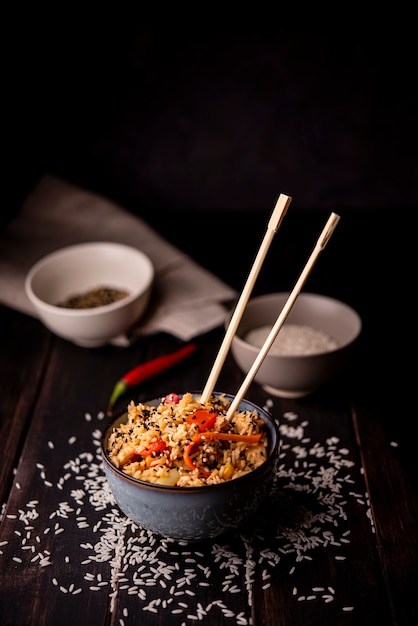 High angle of asian food in bowl with rice