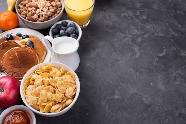 Free photo high angle of assortment of breakfast food with copy space