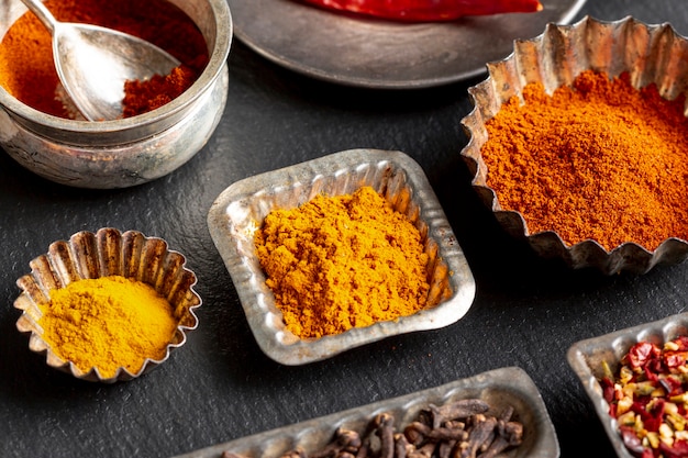 Free photo high angle of assortment of powdered spices