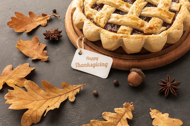 Free photo high angle assortment with delicious pie and leaves