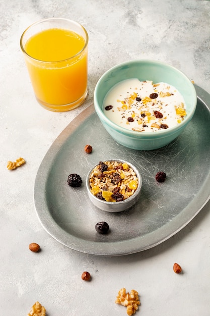 High angle assortment with milk, cereal and juice