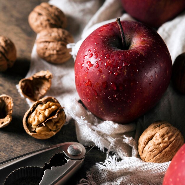 High angle of autumn apple with walnuts