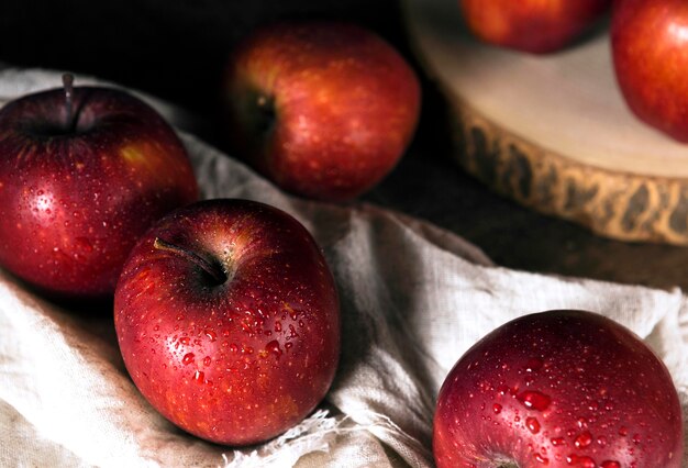 High angle of autumn apples on cloth