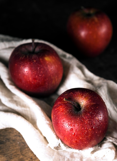 High angle of autumn apples on textile