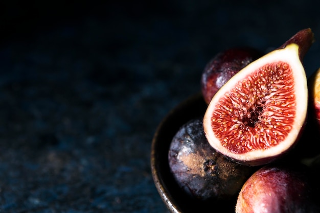 High angle of autumn figs on plate with copy space
