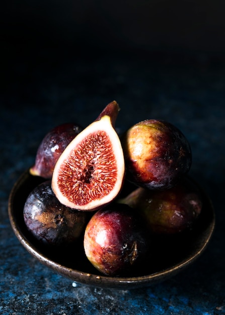 Free photo high angle of autumn figs on plate