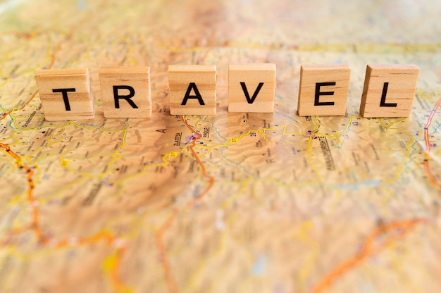 High angle autumn traveling arrangement with wooden letters