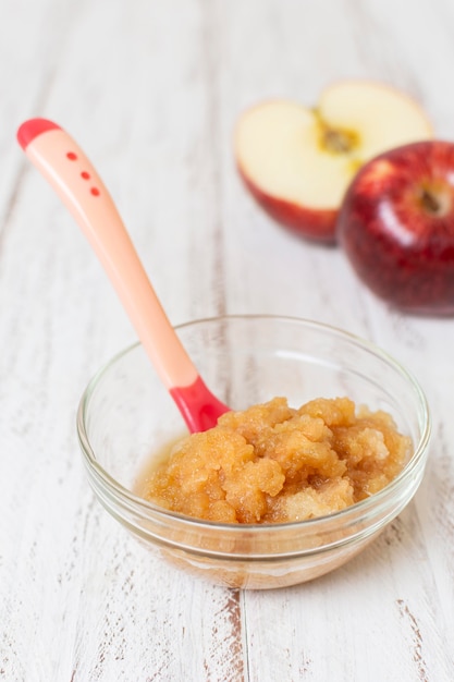 High angle baby food on wooden background