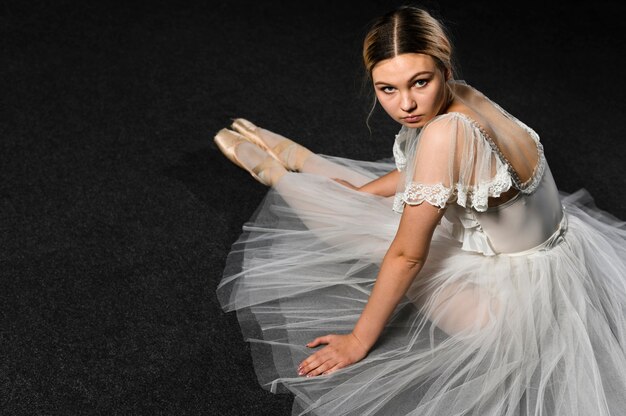 High angle of ballerina in tutu dress with copy space