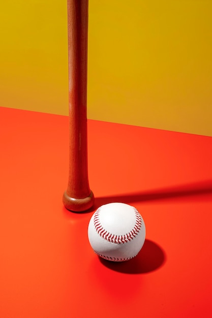 High angle of baseball with wooden bat