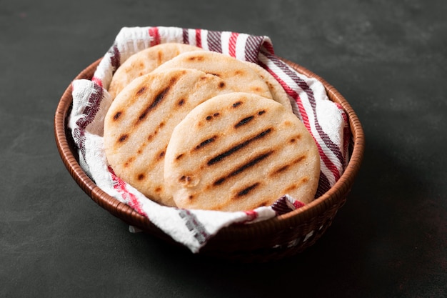 Free photo high angle basket with arepas