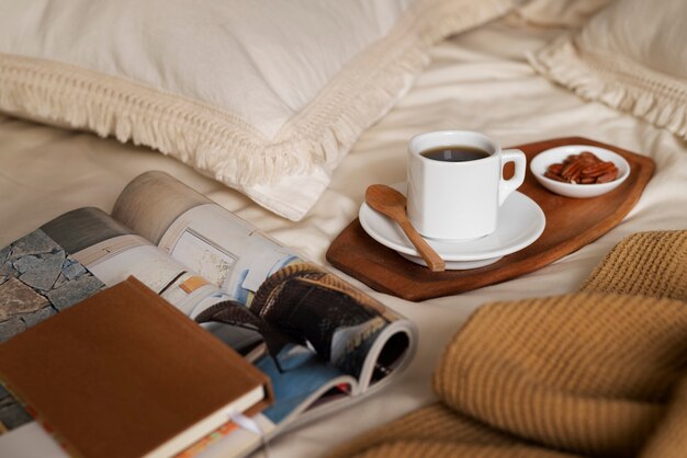High angle bed arrangement with magazine and mug