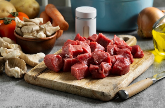 High angle beef on wooden board