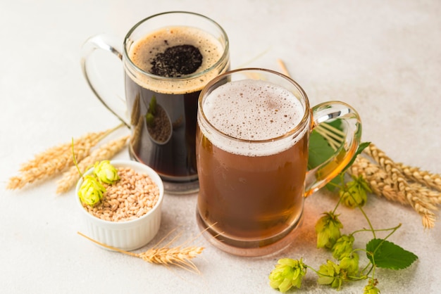 High angle beer mugs and wheat seeds