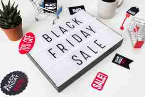 Free photo high angle black friday sale written on light box