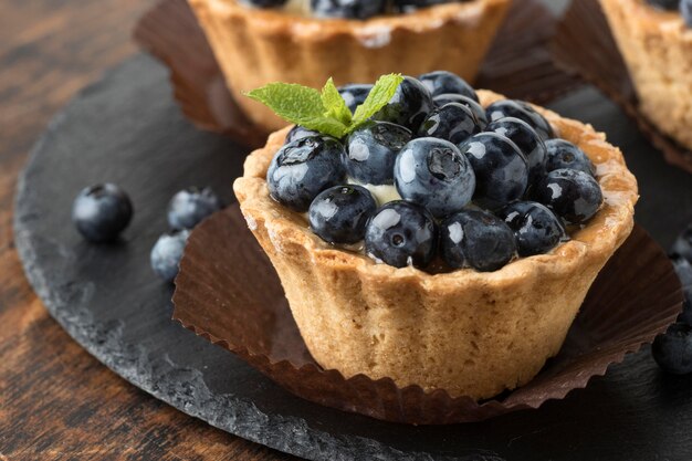 High angle of blueberry tart with mint
