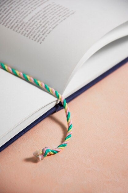 High angle book with textile bookmark