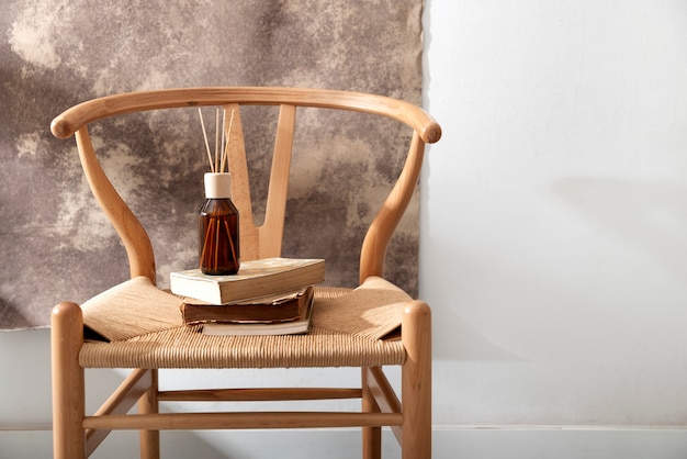 High angle books on wooden chair