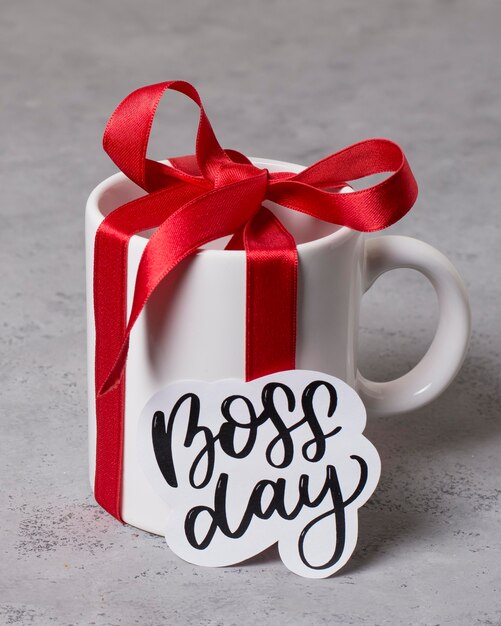 High angle boss's day arrangement with cup gift