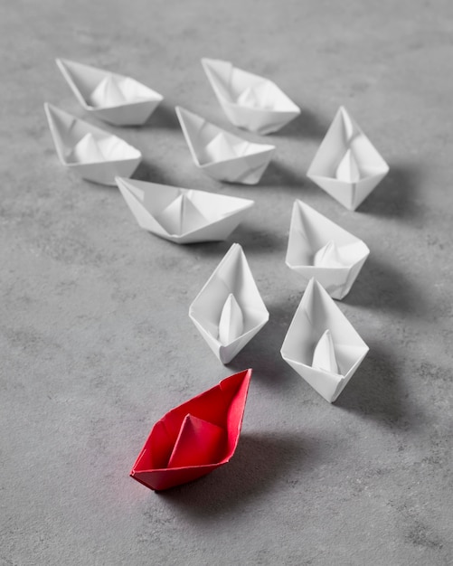 high angle boss's day arrangement with paper boats