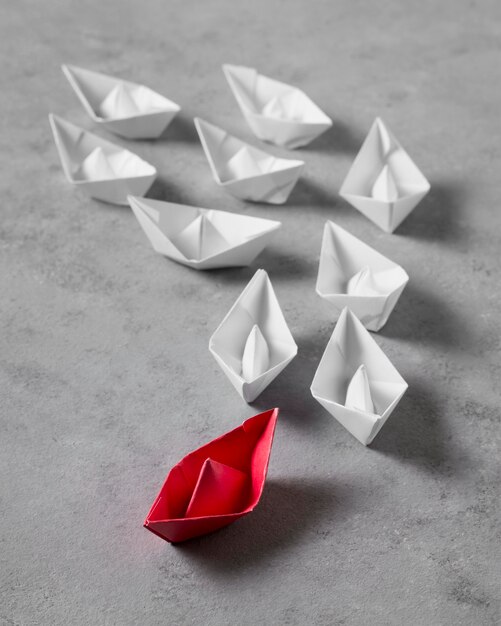 High angle boss's day arrangement with paper boats