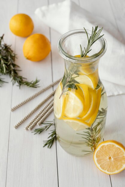 High angle bottle with lemon slices