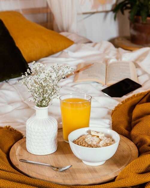 High angle bowl with cereal and juice