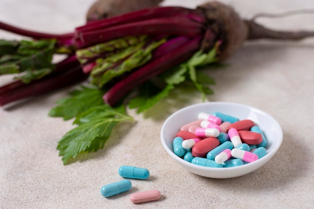 Free photo high angle bowl with colorful pills