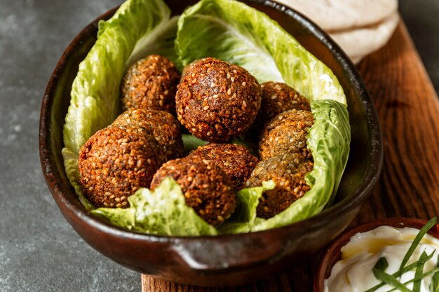 High angle bowl with lettuce and falafel