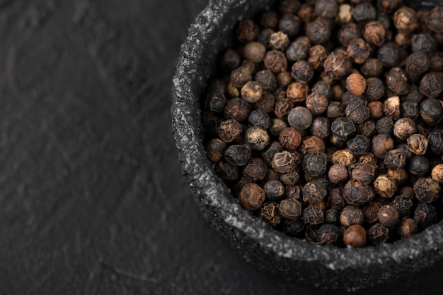 Free photo high angle of bowl with seeds and copy space