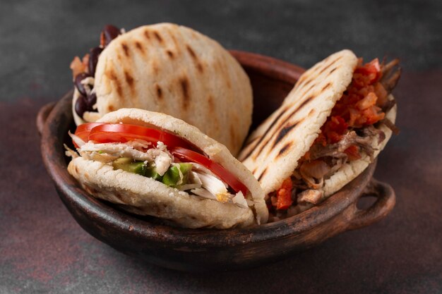 High angle bowl with tasty arepas