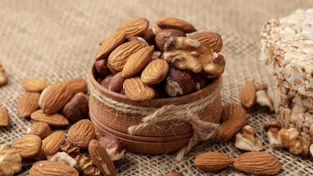 High angle of bowl with walnuts and other nuts