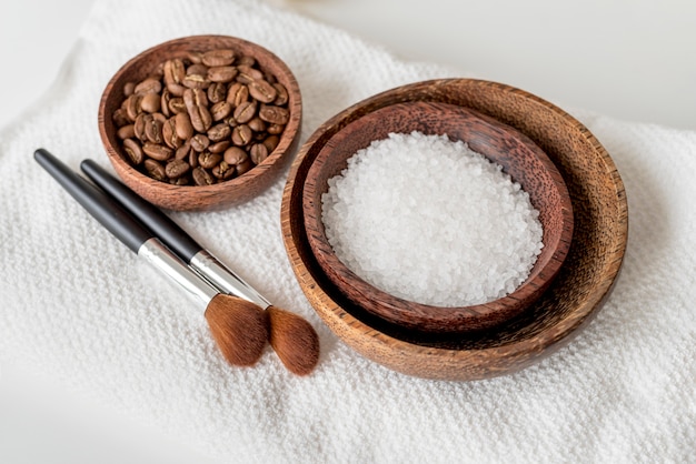 Free photo high angle bowls with salt and coffee beans